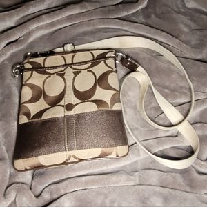Coach brown signature cloth swingpack bag